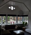 Het wybertjes-raam is niet van een bovenverdieping, maar geeft licht in de kamer.
<br/>
Richard Keijzer, 2015-02-14